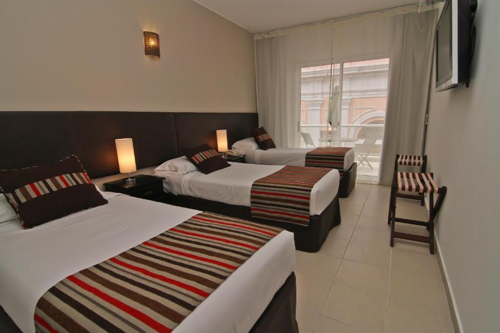 De La Plaza Hotel Maldonado Quarto foto