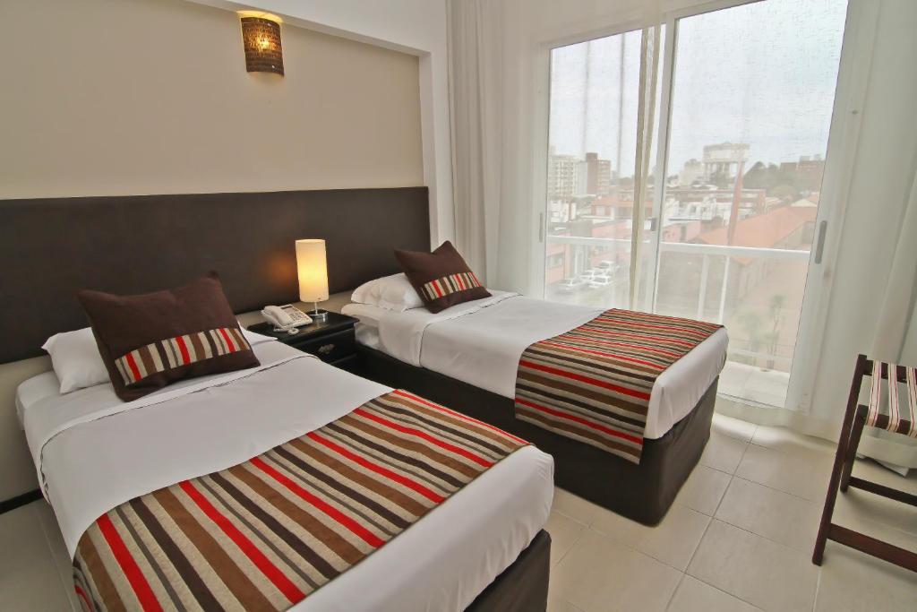 De La Plaza Hotel Maldonado Quarto foto